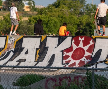 Youth play at a skatepark in Pine Ridge on the Pine Ridge Indian Reservation in South Dakota on July 22, 2021