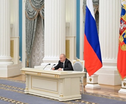 Putin at the Feb. 24 meeting with businessmen. Alluding to sanctions they might face over the war in Ukraine, he said: “We all understand the world we live in.”