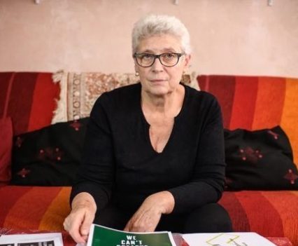 Claude Mangin, shown at her home in suburban Paris, has been waging an international campaign to win the freedom of her husband, political activist Naama Asfari, who has been jailed in Morocco for more than a decade. Her iPhone 11 was hacked last month with Pegasus spyware.