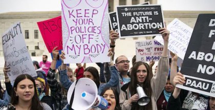 Abortion rights advocates and antiabortion demonstrators gather outside the U.S. Supreme Court on May 3.
