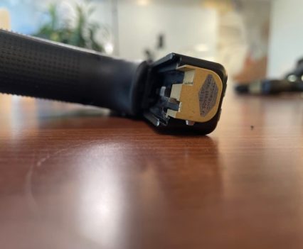 An auto sear installed on a Glock handgun
