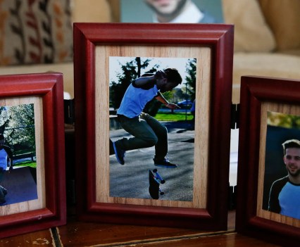 Three framed pictures of a young man smiling and skateboarding