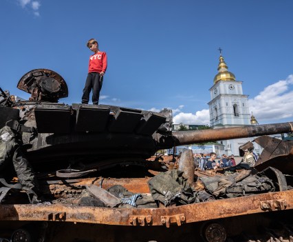 Ukrainians exploring burned Russian tanks and vehicles exposed in the central Kyiv, as Russian-Ukrainian war continues since February 24, 2022