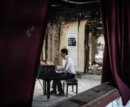 Sorush Zali, Ukrainian artist, performs the Arno Babajanyan Elegy in the destroyed house of culdute in Irpin, Ukraine. he dedicates this performanse to all sorrow and grief Ukrainains endured during the occupation.