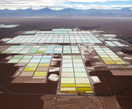 An aerial view of brine pools and processing areas of the Soquimich lithium mine in the Atacama desert of northern Chile