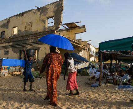 After flooding, the hollowed ruins of a school in Senegal remain, a daily reminder of the sea’s power.