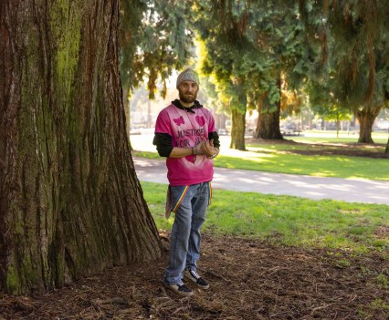 Nikki Kuhnhausen's brother Konrad in a "Justice for Nikki" t-shirt in Esther Short Park in Vancouver, Washington.