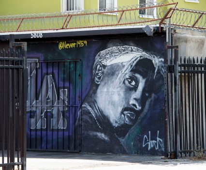 Twenty years after his death, Tupac still reigns. Other rappers have succeeded him in stardom, and promotional efforts around Tupac have been haphazard, but the artist who died at age 25 on September 13, 1996, in Las Vegas, maintains a hold that is among the most enduring in recent times. / AFP / VALERIE MACON / TO GO WITH AFP STORY by Shaun TANDON, "20 years on, Tupac reigns as potent global force" (Photo credit should read VALERIE MACON/AFP via Getty Images)