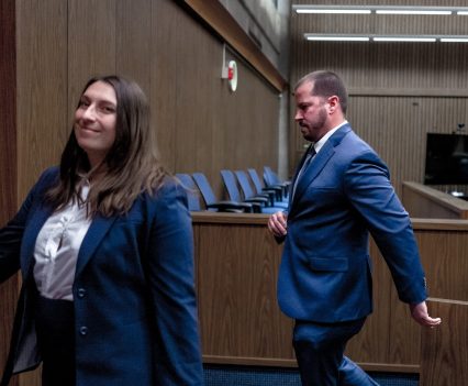 Katelyn Knight exits a Solano County courtroom with Ofc. David McLaughlin on March 23, 2022, after he testified about his role in Vallejo’s “Badge of Honor” scandal. McLaughlin was not involved in the evidence purge.