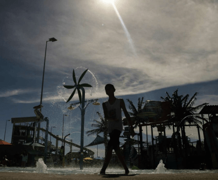 A swimmer exits the water at The Wave Waterpark in Dublin, California.