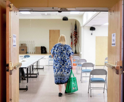 Martinez resident Helen Ryan, 58, enters a cooling center set up inside Martinez Senior Community Center in 2020. Cities activate cooling centers when dangerously high temperatures are forecast.