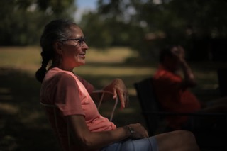 Arlinda Locklear spends time with family at her uncle’s Pembroke, N.C. farm during the annual Lumbee Homecoming. (Travis Dove for The Assembly)