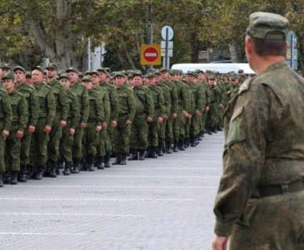 Reservists drafted during the partial mobilisation attend a ceremony before departure for military bases, in Sevastopol, Crimea September 27, 2022.