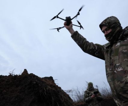 Two soldiers with the 58th Independent Motorised Infantry Brigade of the Ukrainian Army, who wanted to be identified as "Ghost", 24, and "Soap", 30, test-fly a drone near Bakhmut, Ukraine, November 25, 2022