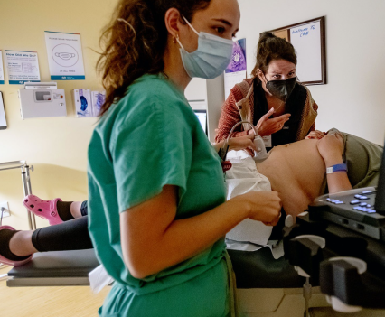 A family physician and her resident perform an ultrasound on a 25-year-old woman the day before the Supreme Court overturned Roe v. Wade at the Center for Reproductive Health clinic in Albuquerque, New Mexico. New Mexico will see an influx of patients from neighboring states which have banned abortion.