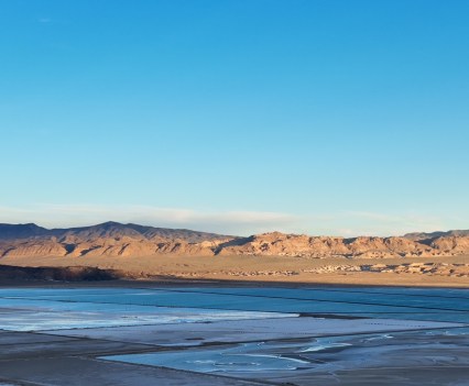 Photo of ponds in Silver Lake Nevada, site of Lithium mine after water has evaporated and leaves a white, lithium-rich material