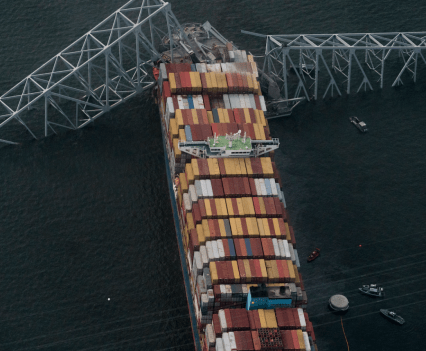 Photo of bridge collapsing as ship hits it