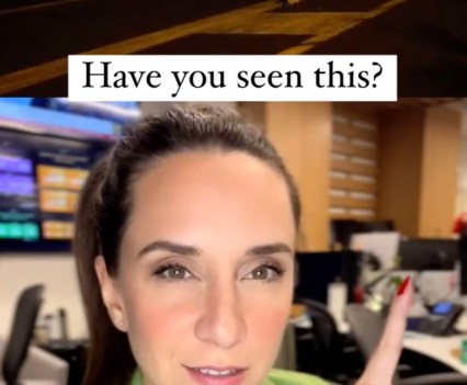 Screenshot of a woman from a social media video pointing upwards to text "Have you seen this?"