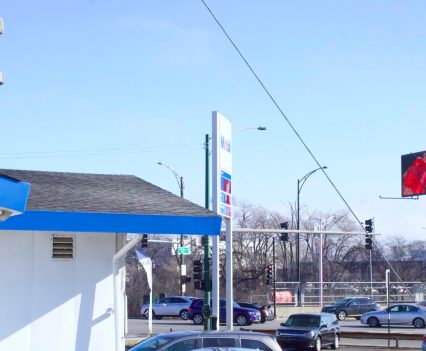 A ShotSpotter sensor attached to a gas station chimney