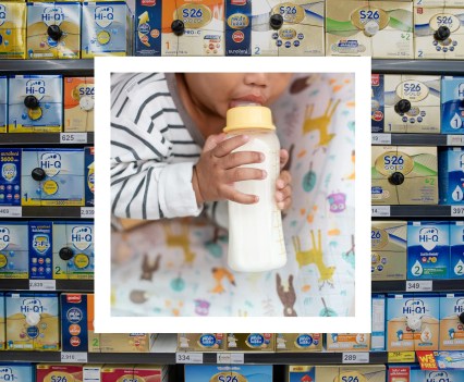 Rows of boxes of formula stock store shelves in the background. Over the top is a portrait of a baby drinking from a baby bottle