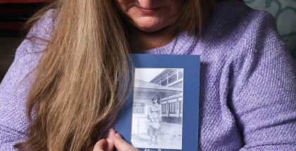 At her Auburn home, Carrie Davidson holds a photo of her great-grandmother, Lillian. (Karen Ducey / The Seattle Times)