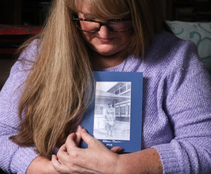 At her Auburn home, Carrie Davidson holds a photo of her great-grandmother, Lillian. (Karen Ducey / The Seattle Times)