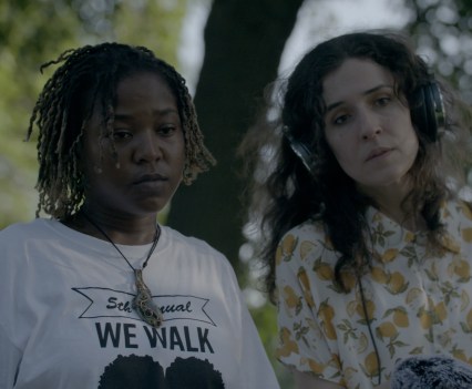 Photo of two women standing next to each other outside